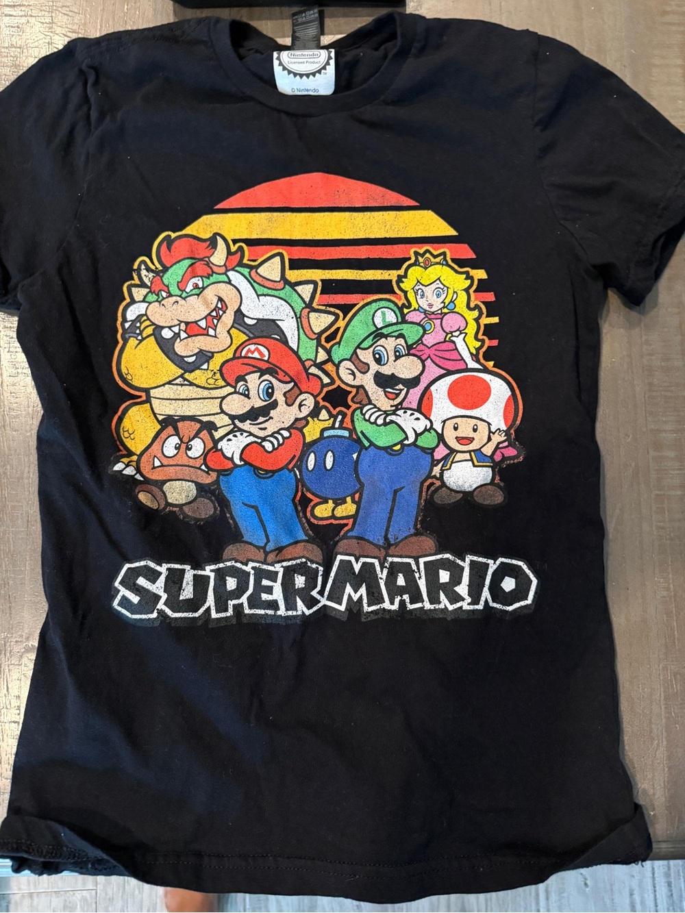 Nintendo Super Mario Black Tee with Colorful Character Graphic